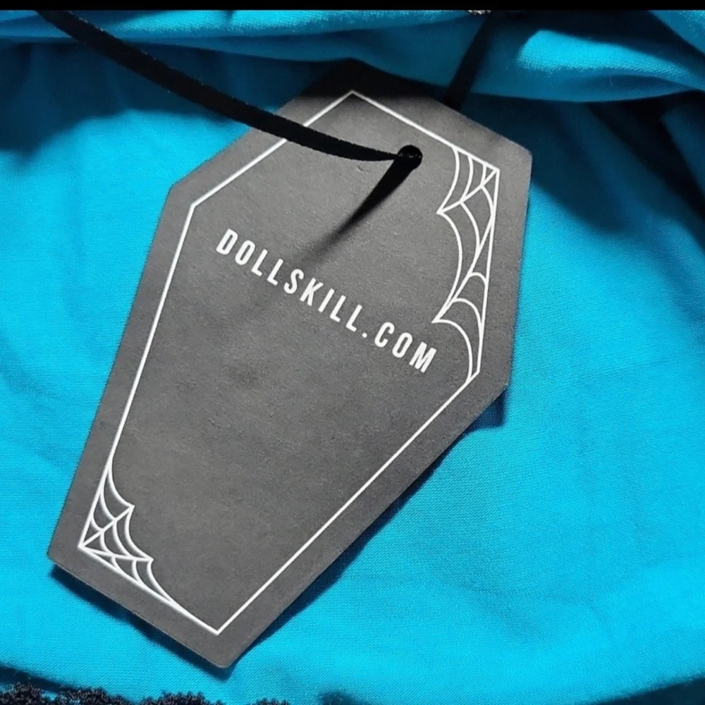 Chic Asymmetrical Teal Dress with Black Trim - Picture 9 of 9